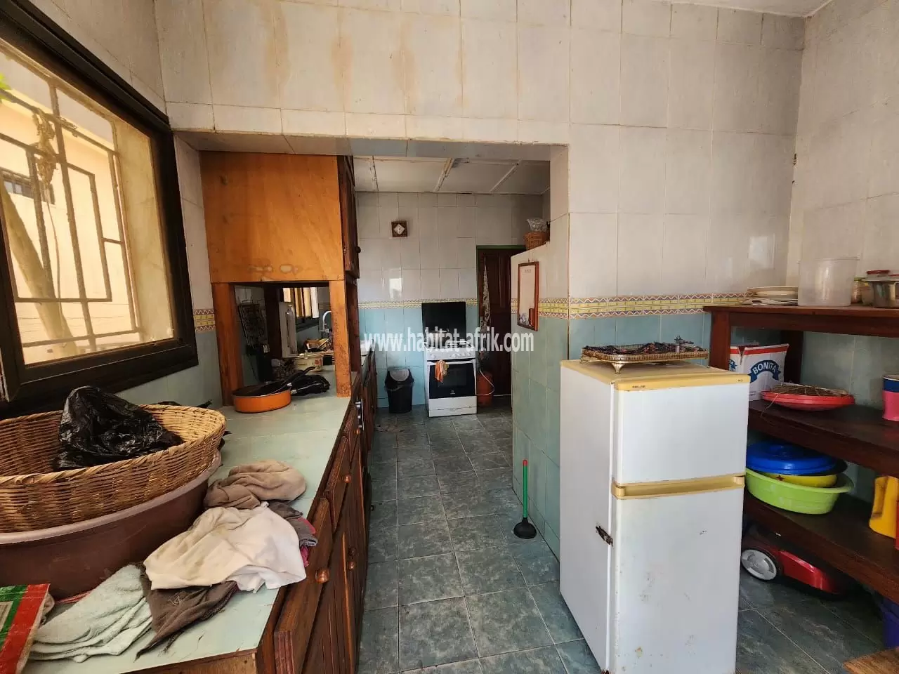 Je mets en vente une maison sur un lot trois (3) chambres dans la caisse lome togo