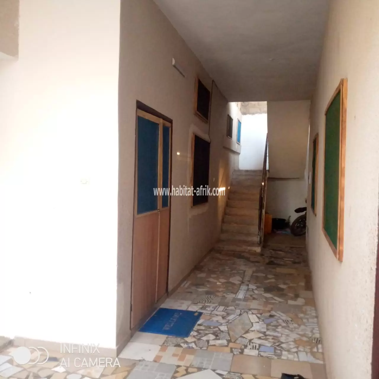 Maison de location dallée et carrelée sur 1/4 lot carré en vente à Adidogomé Ségbé Kpodji(Lomé-Togo)